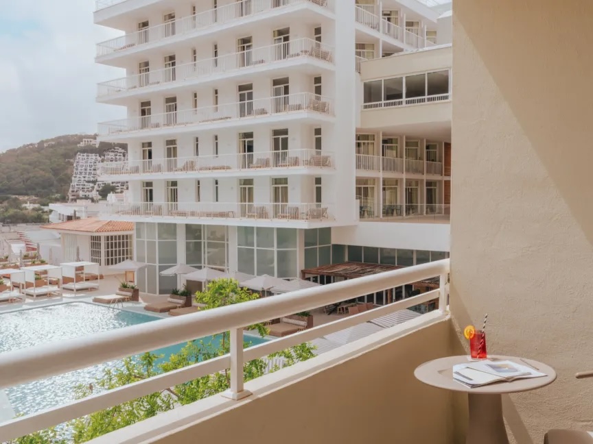 Balcony overlooking the pool at Hyde Ibiza.