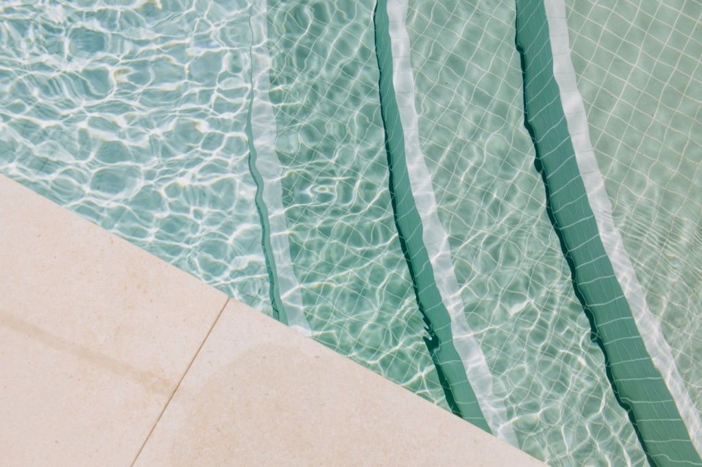 Close-up of sunlit pool water
