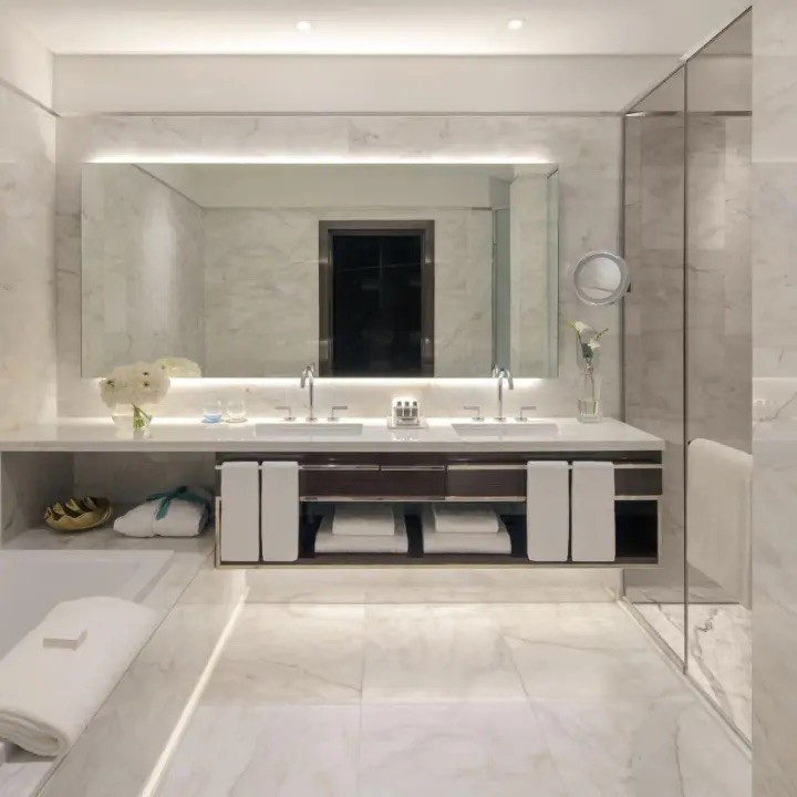 bathroom with two sinks and big mirror