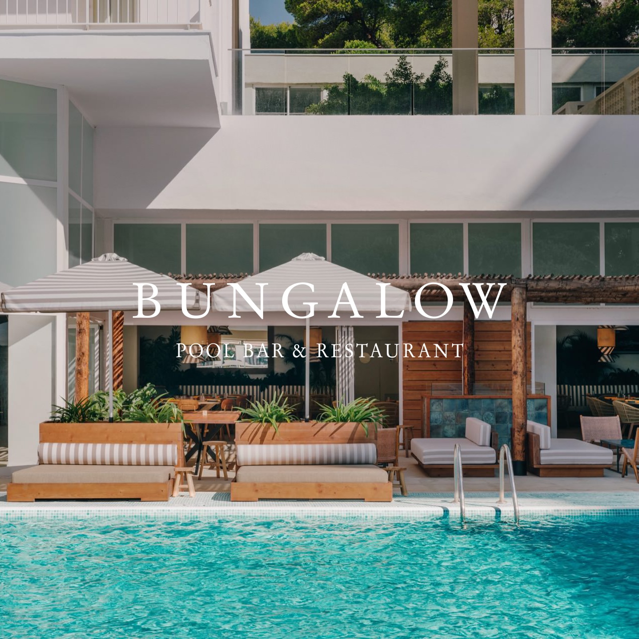 outdoor pool and sunloungers at Bungalow pool bar and restaurant at Hyde Ibiza