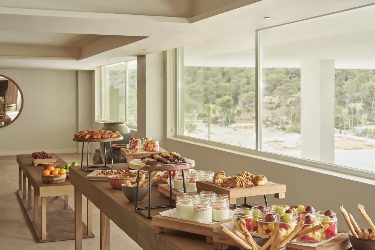 a long table with brunch items laid out on it and Hyde Ibiza