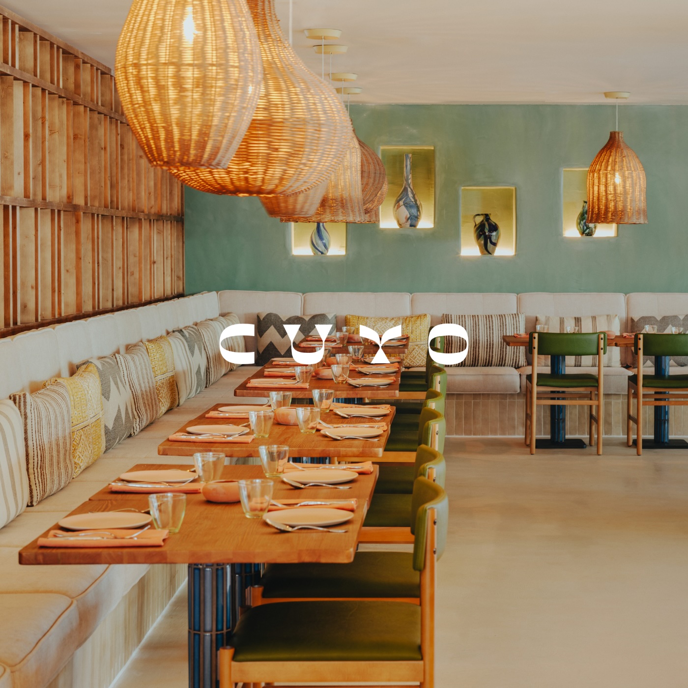 bohemian style decor with Table and chairs at Cuyo in Hyde Ibiza.
