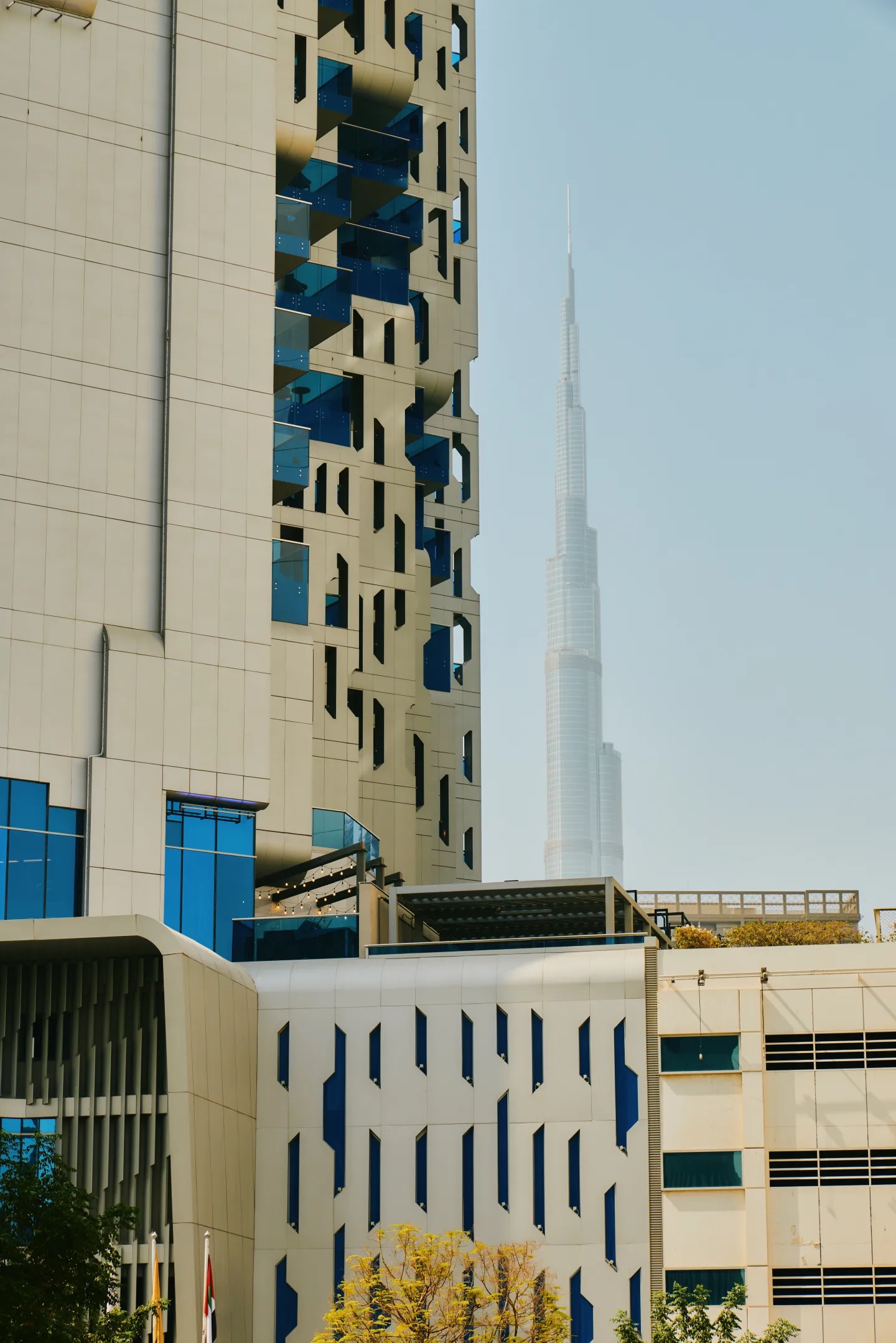 image of tall building with the burj khalifa in the background