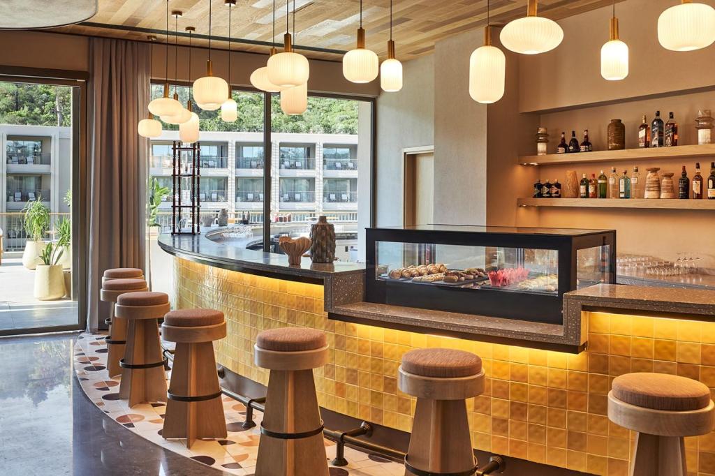 Bar seating at a low lit restaurant called Sun and Moon at Hyde Bodrum