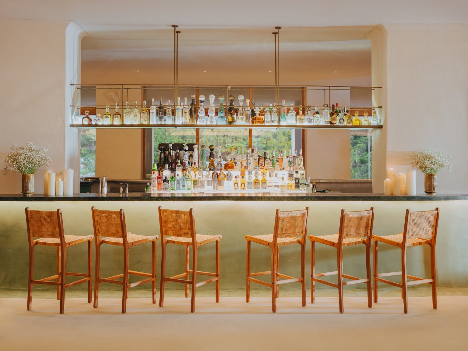 the bar at Cuyo with some empty high chairs against it