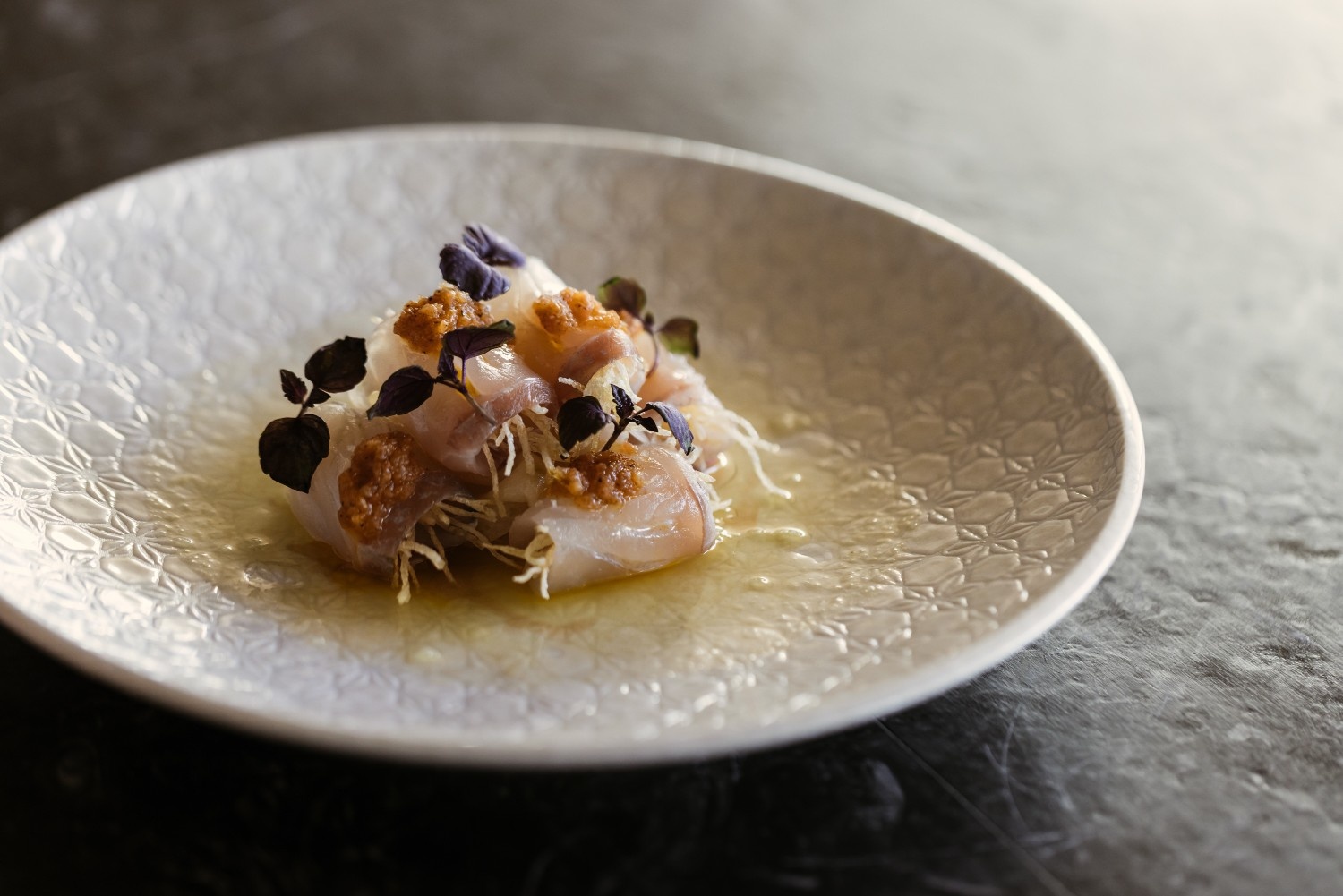 delicate japanese dish on a white plate
