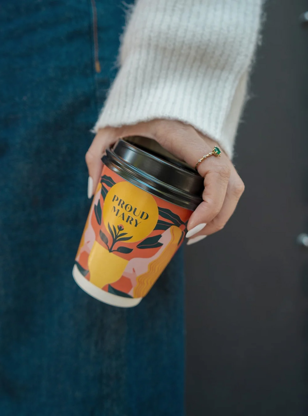 Proud coffee takeaway cup.