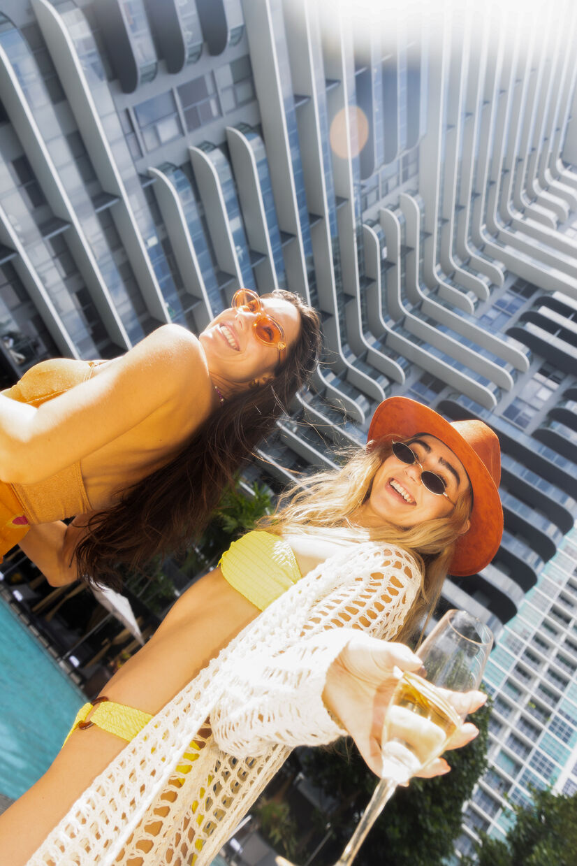 two girls with drinks - Hyde Midtown Miami