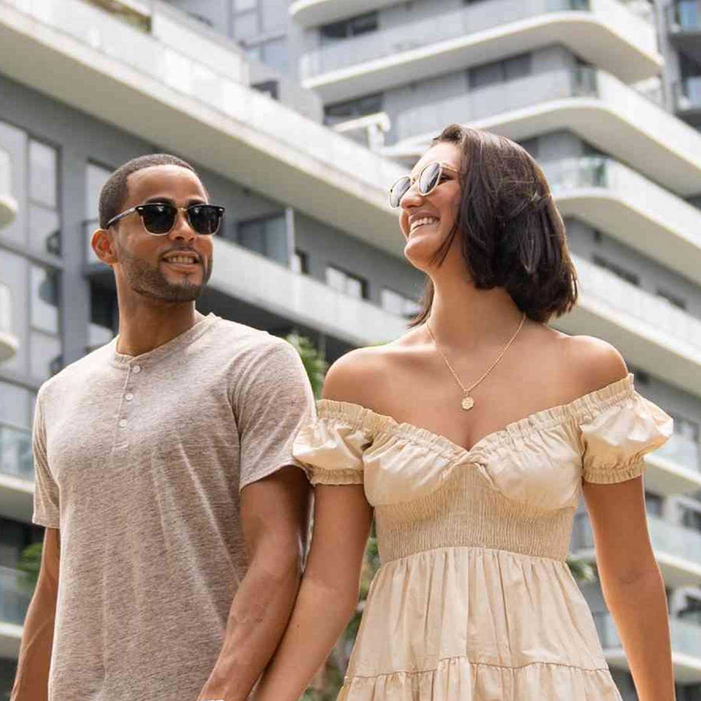Couple holding hands outside of Hyde Midtown Miami