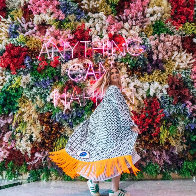 Hyde Dubai Woman with Flower Wall Anything Can Happen