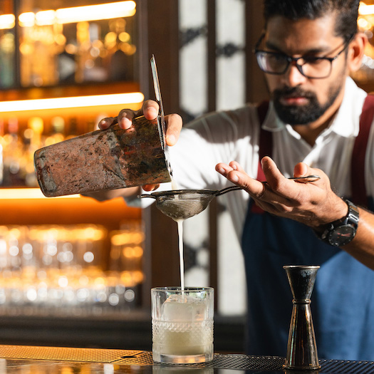 Hyde Dubai Hudson Tavern Bartender Making Cocktail