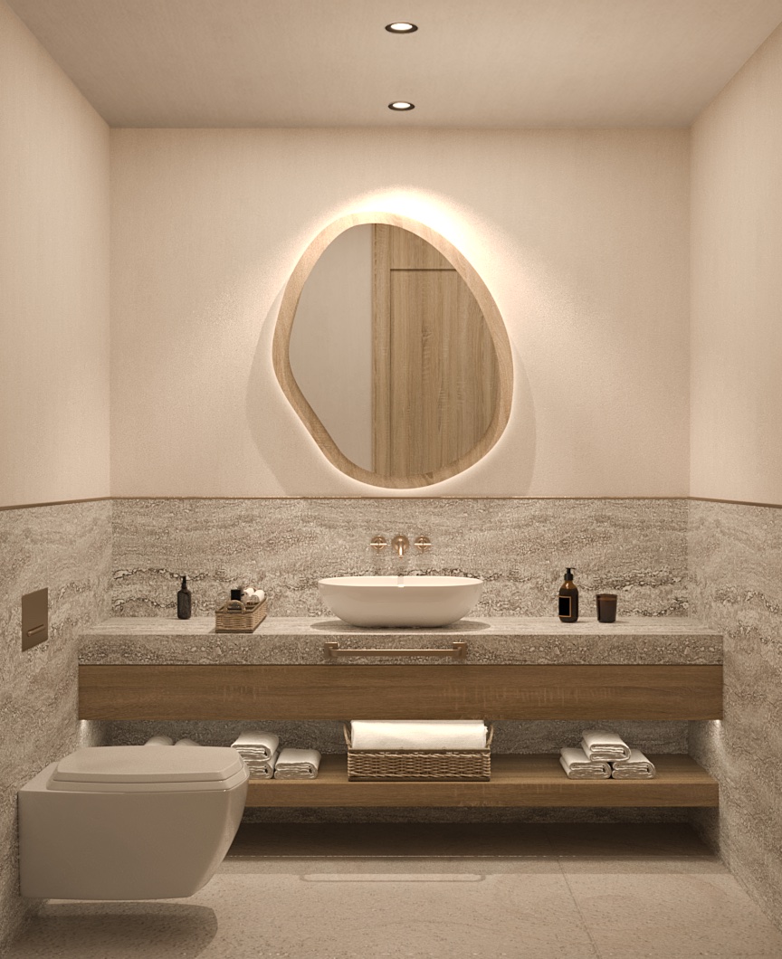 Cream bathroom with large counter top and white sink, oval shaped mirror, and toilet